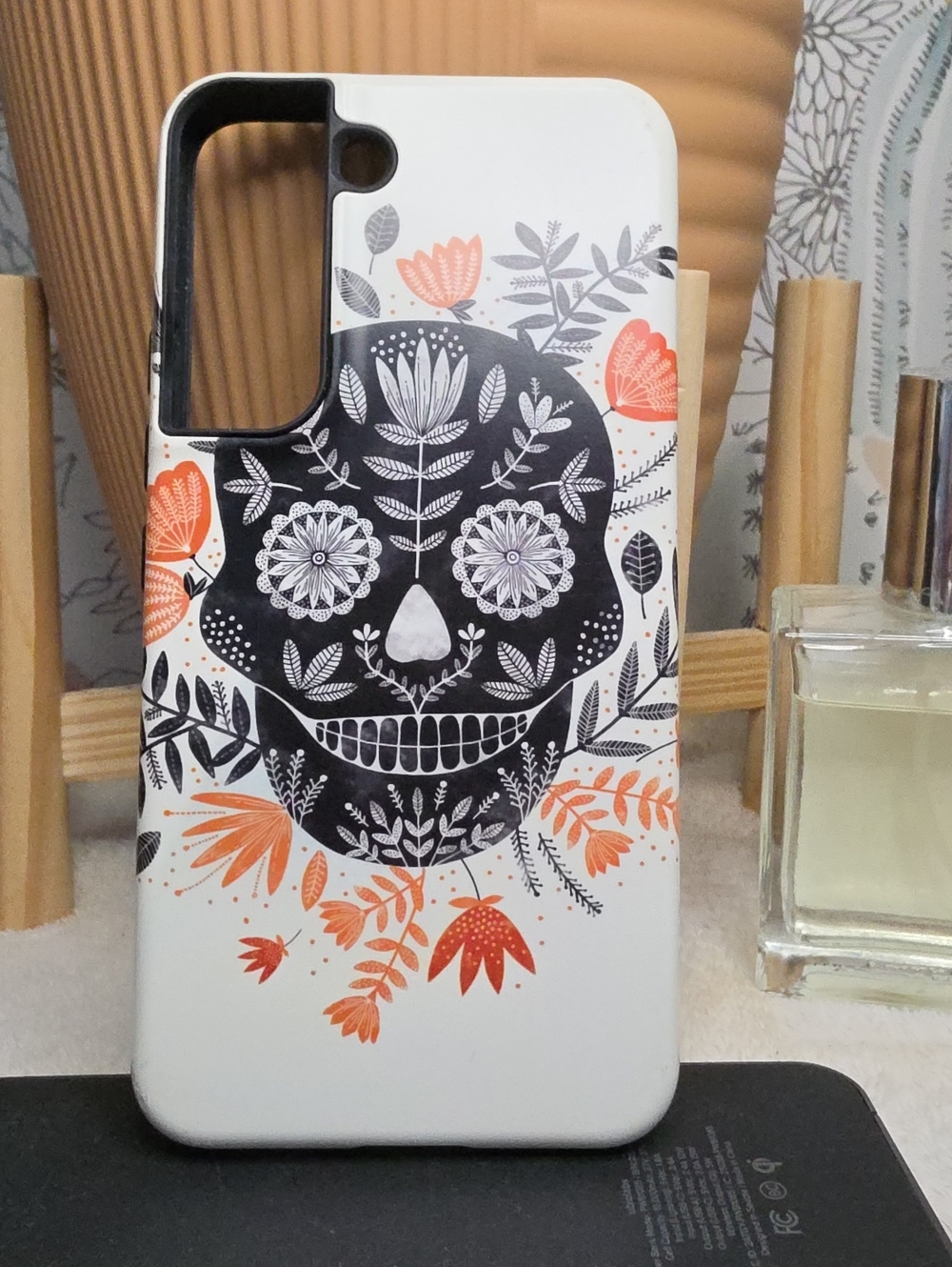 Samsung Galaxy S22 Stringberry Floral Sugar Skull Phone Case in Black & Orange